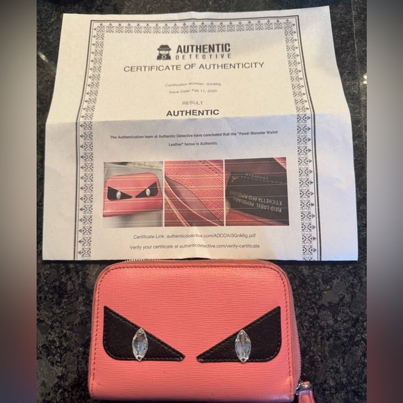 Fendi Handbags - Fendi Monster Compact Wallet w COA🩷🩷🩷